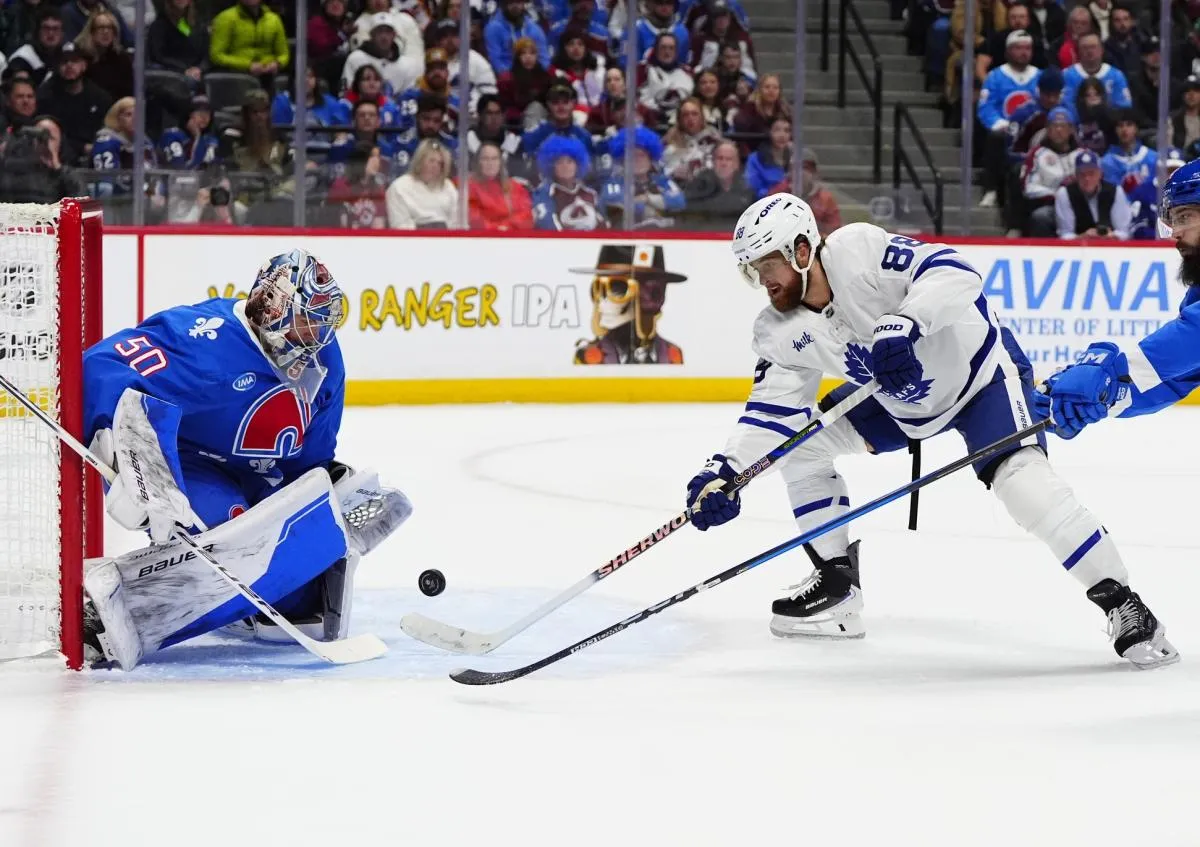 Toronto Maple Leafs right wing William Nylander (88) shoots the puck at Colorado Avalanche goaltender Trent Miner (50) in the first period at Ball Arena.