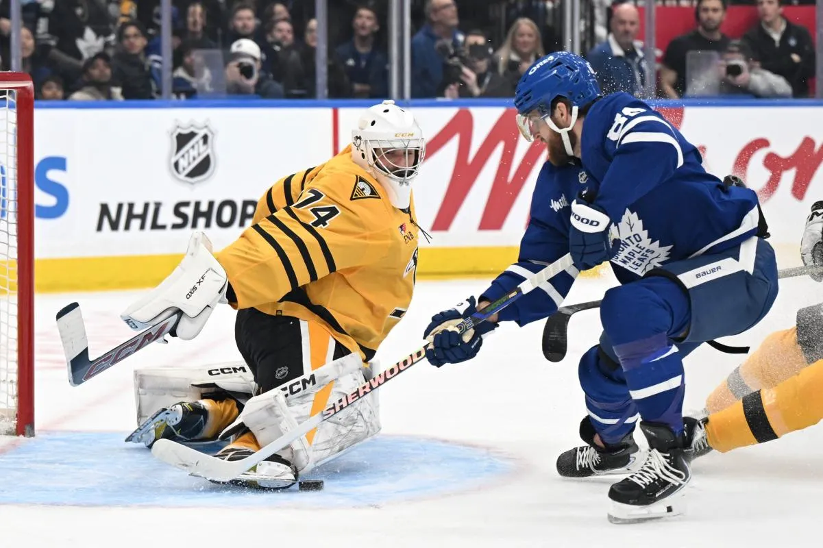 Pittsburgh Penguins goalie Stuart Skinner (74) makes a save on a scoring attempt by Toronto Maple Leafs forward William Nylander (88) in the third period at Scotiabank Arena.