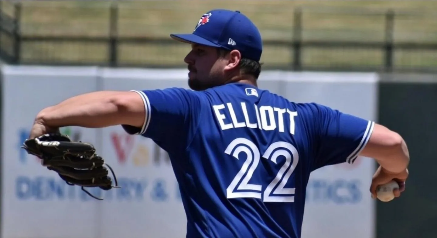 Former Toronto Blue Jays pitching prospect Evan Elliott throwing a pitch.