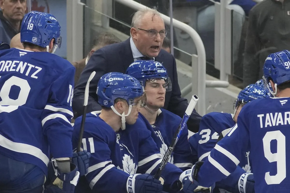 Toronto Maple Leafs head coach Craig Berube talks to his players during a break in the action against the Colorado Avalanche at Scotiabank Arena.