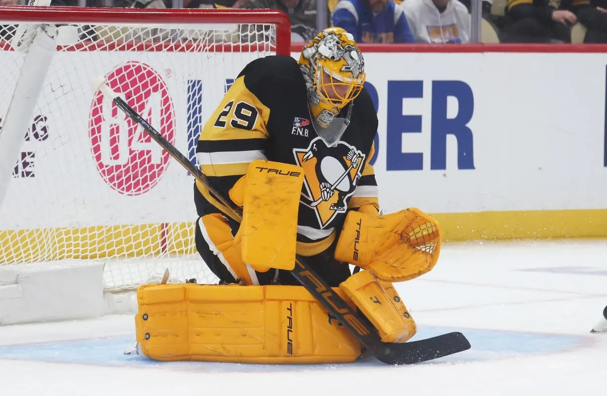 Pittsburgh Penguins goaltender Marc-Andre Fleury (29) makes a save against the Columbus Blue Jackets during the third period at PPG Paints Arena.