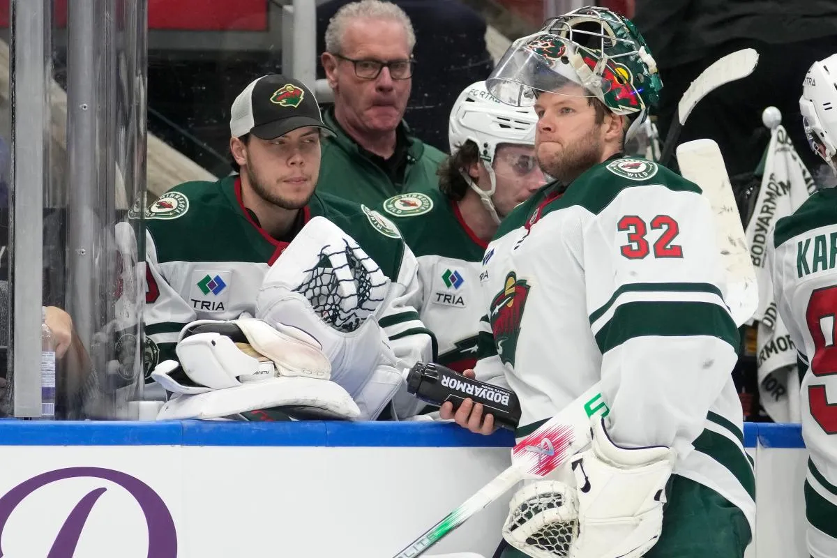 Minnesota Wild goaltenders Jesper Wallstedt (30) (left) and Filip Gustavsson (32) look on during a timeout in the third period against the Toronto Maple Leafs at Scotiabank Arena.