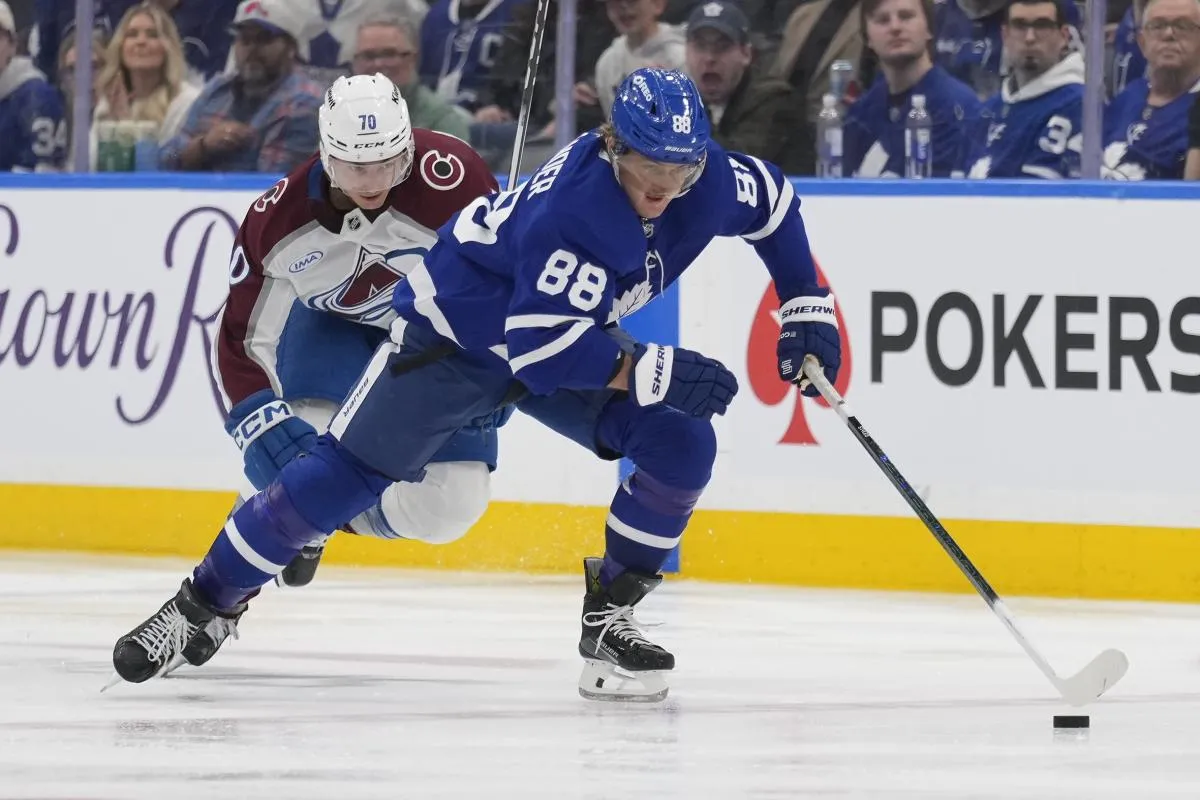 Toronto Maple Leafs forward William Nylander (88) skates past Colorado Avalanche defenseman Sam Malinski (70) during the third period at Scotiabank Arena.