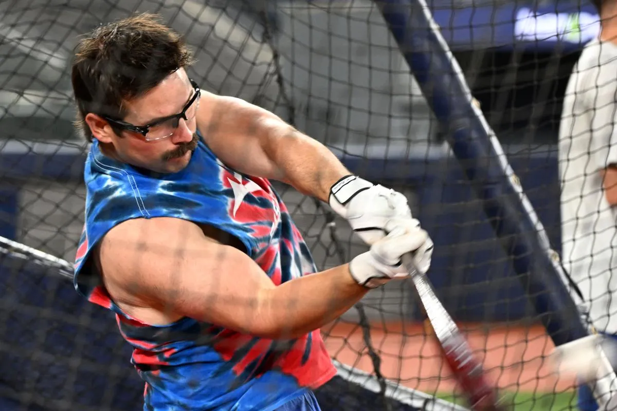Toronto Blue Jays outfielder Davis Schneider (36) takes batting practice during workouts for the American League Championship Series at Rogers Centre.