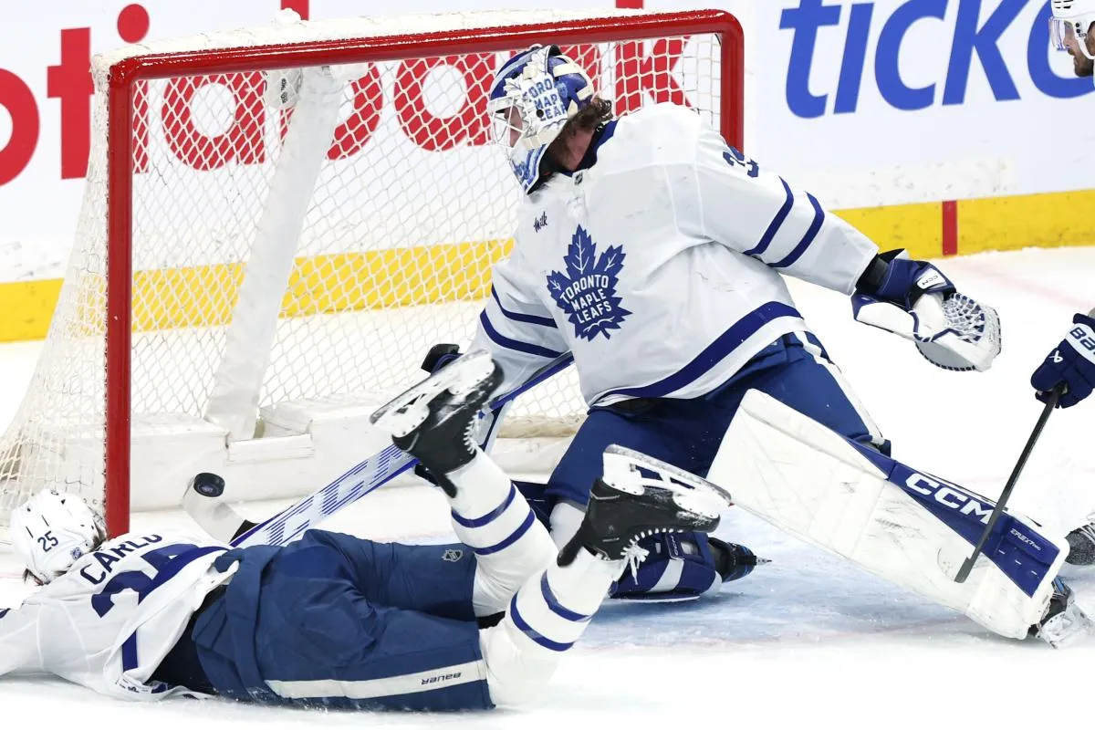 Toronto Maple Leafs goaltender Dennis Hildeby (35) makes a stick save against the Winnipeg Jets in the third period at Canada Life Centre.