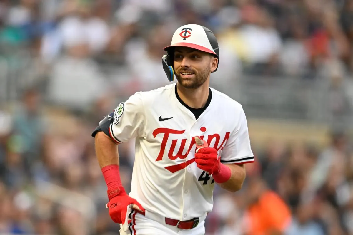 Edouard Julien jogging during a game with the Twins