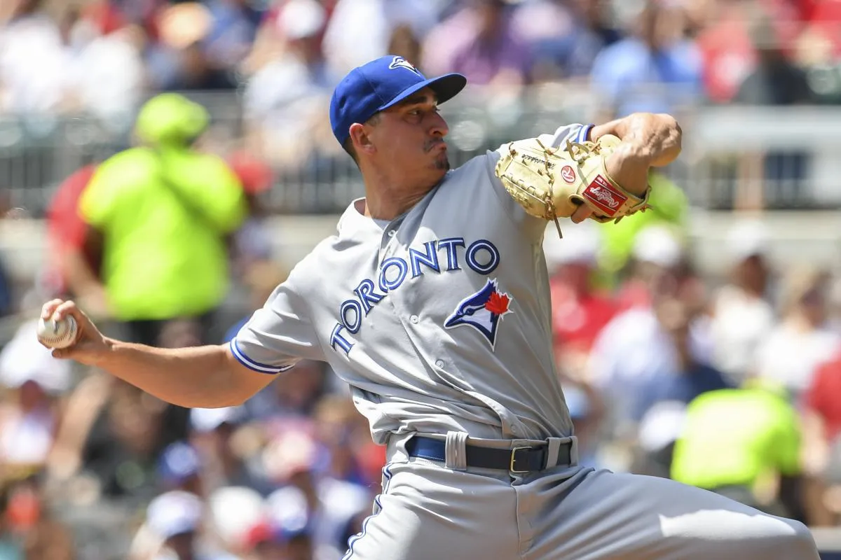 Toronto Blue Jays starting pitcher Jacob Waguespack (62) pitches against the Atlanta Braves during the first inning at SunTrust Park.