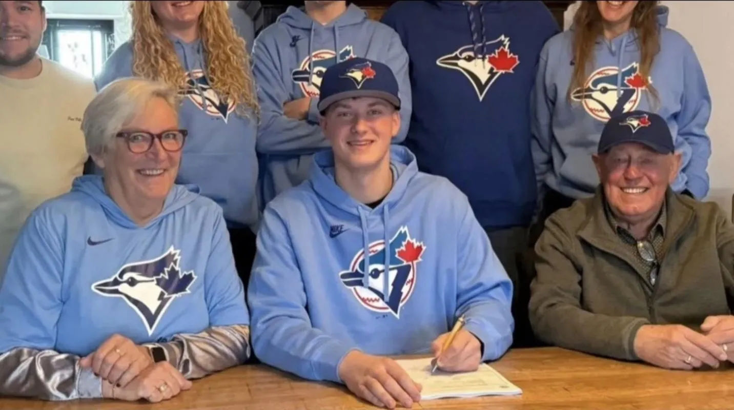 Toronto Blue Jays international free agent pitcher Celwin Hurkmans signs his first professional contract at 17 years old.