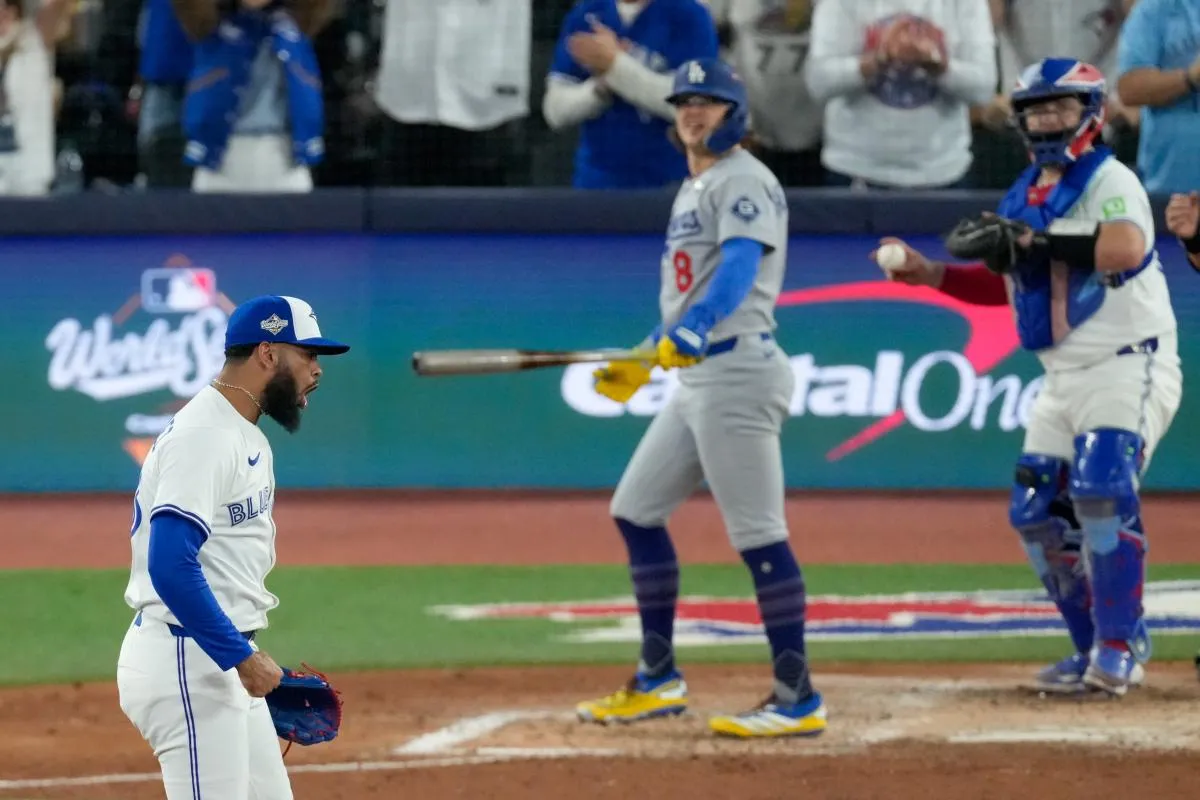Toronto Blue Jays pitcher Seranthony Dominguez (48) reacts after striking out Los Angeles Dodgers left fielder Enrique Hernandez (8) in the sixth inning during game one of the 2025 MLB World Series at Rogers Centre.