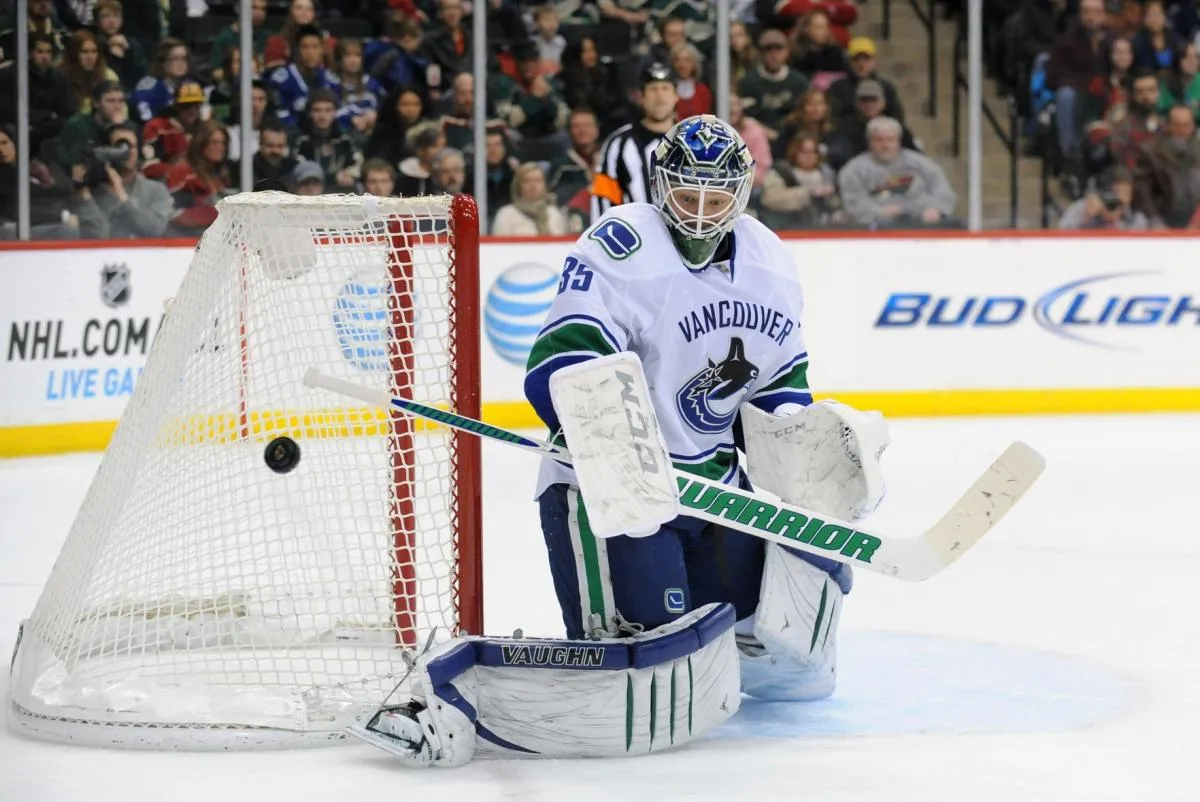 Vancouver Canucks goalie Cory Schneider (35) makes a save in the second period against the Minnesota Wild at Xcel Energy Center.