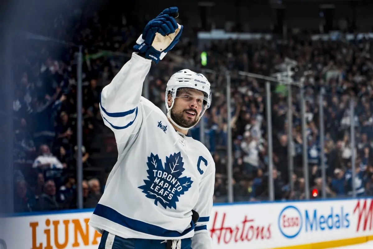 Toronto Maple Leafs forward Auston Matthews (34) celebrates his game winning shootout goal against the Vancouver Canucks at Rogers Arena