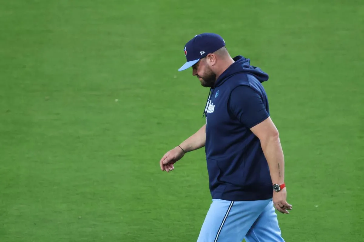 Toronto Blue Jays manager John Schneider (14) makes a pitching change during the sixth inning against the Los Angeles Dodgers during game four of the 2025 MLB World Series at Dodger Stadium.