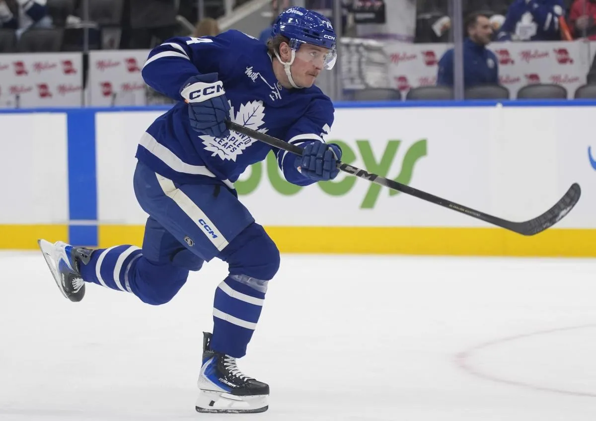 Toronto Maple Leafs forward Bobby McMann (74) shoots the puck during warm up before a game against the Buffalo Sabres at Scotiabank Arena.