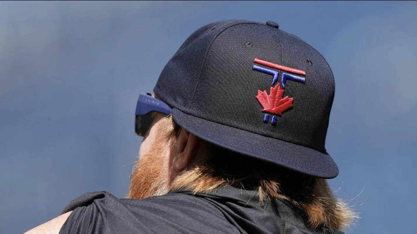 Toronto Blue Jays third base Justin Turner (2) watches batting practice wearing the new City Connect baseball cap before a game against the Pittsburgh Pirates at Rogers Centre.