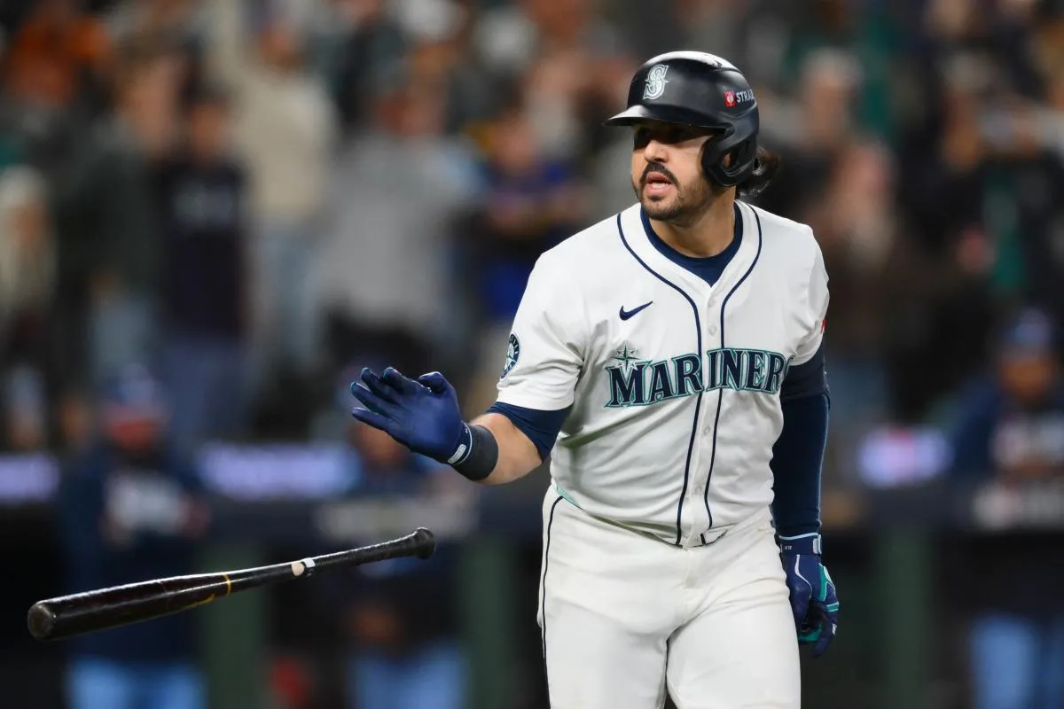 Seattle Mariners third baseman Eugenio Suarez (28) tosses his bat after hitting a grand slam against the Toronto Blue Jays during the eighth inning during game five of the ALCS round for the 2025 MLB playoffs at T-Mobile Park.
