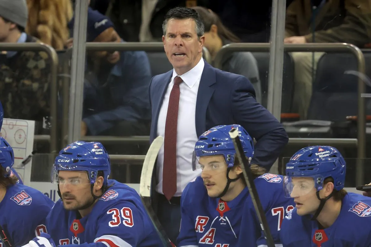 New York Rangers head coach Mike Sullivan coaches against the Vancouver Canucks during the first period at Madison Square Garden.