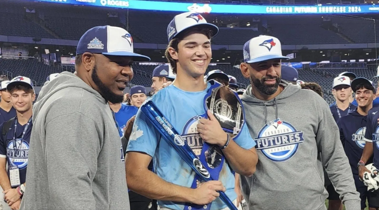 Former Toronto Blue Jays slugger Edwin Encarnacion with Canadian Showcase Home run Derby winner Tim Piasentin and Blue Jays legend Jose Bautista at Rogers Centre in Toronto Ontario, Canada.