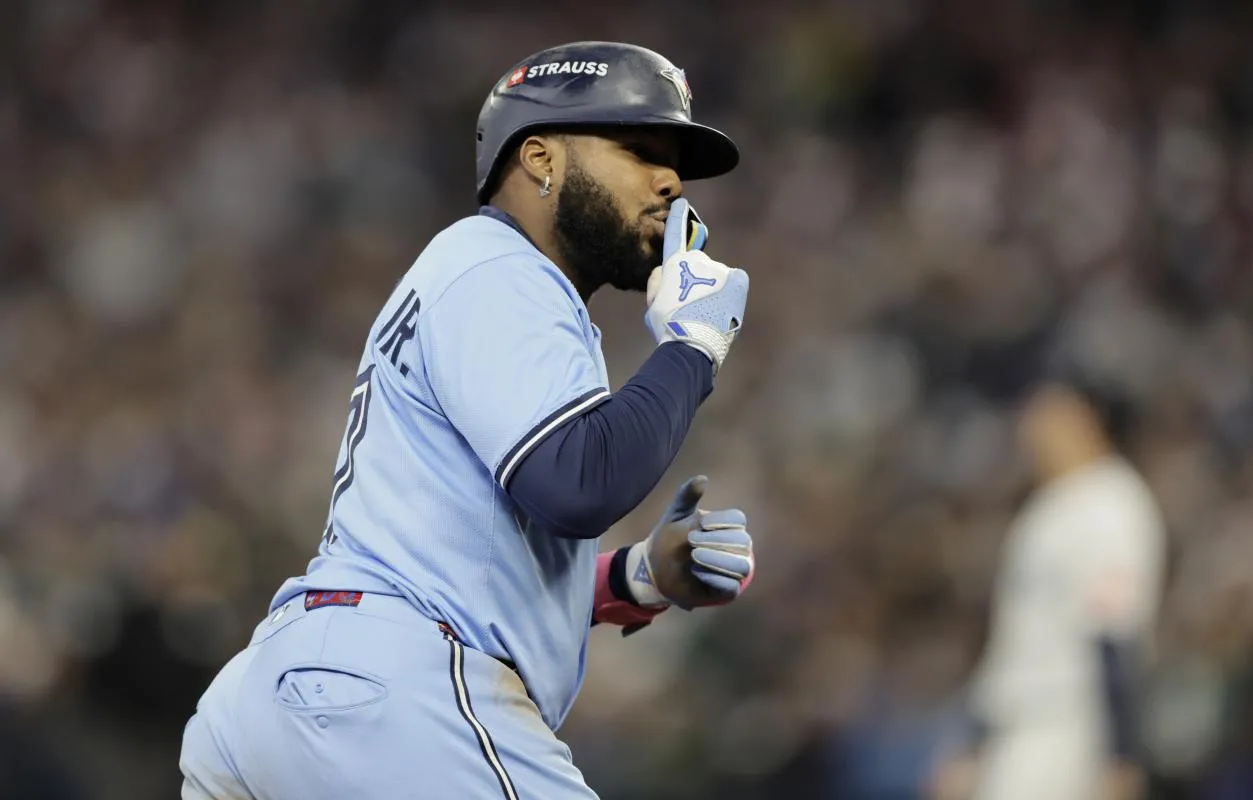 Toronto Blue Jays first baseman Vladimir Guerrero Jr. (27) celebrates after hitting home run in the fifth inning against the Seattle Mariners during game three of the ALCS round for the 2025 MLB playoffs at T-Mobile Park.