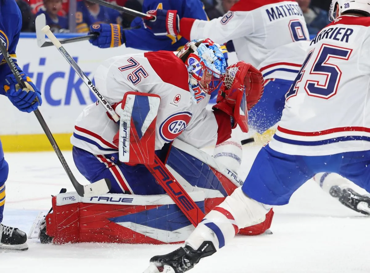 Le 31 janvier 2026, &agrave; Buffalo, dans l'&Eacute;tat de New York, aux &Eacute;tats-Unis, le gardien de but des Canadiens de Montr&eacute;al, Jakub Dobes (75), effectue un arr&ecirc;t lors du deuxi&egrave;me tiers contre les Sabres de Buffalo au KeyBank Center.