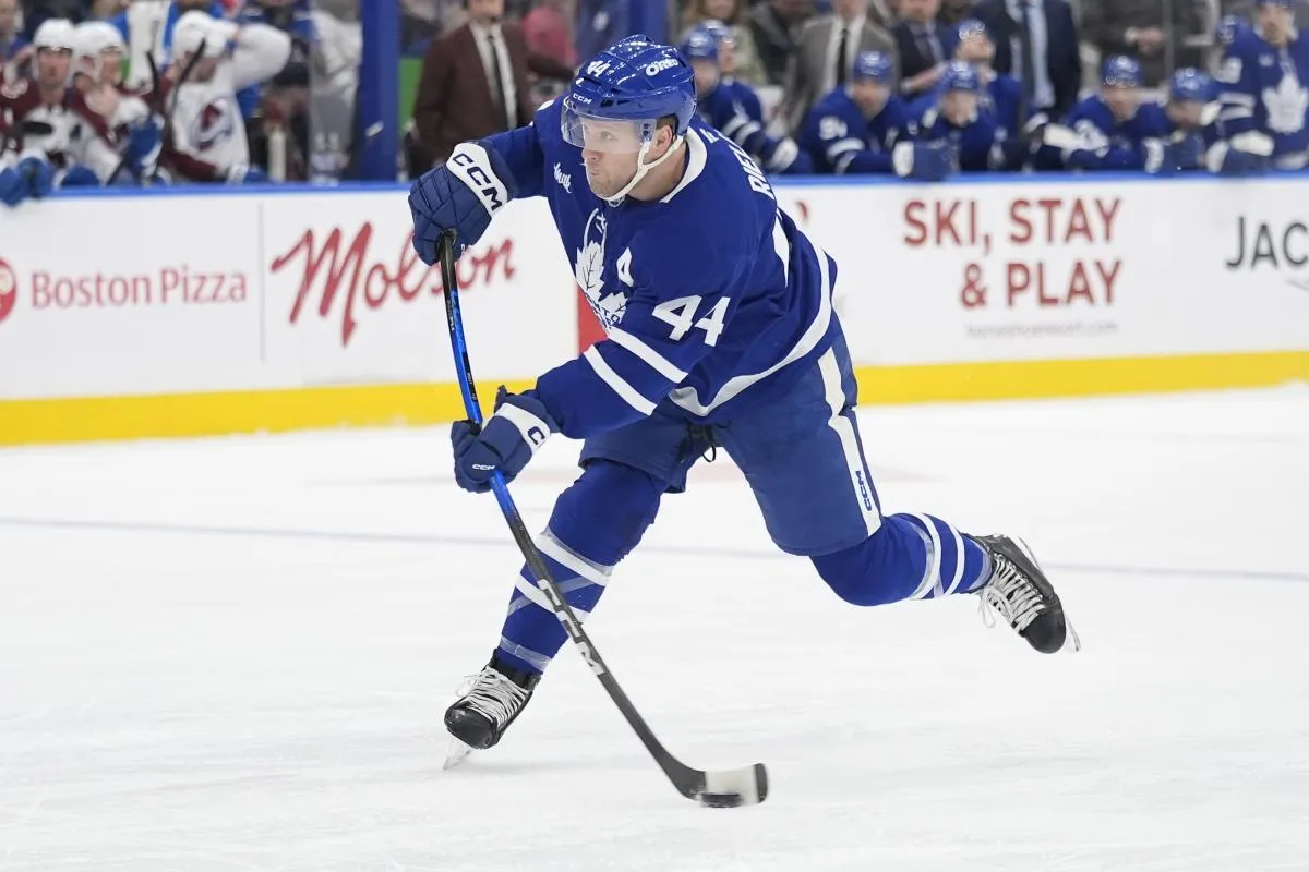Toronto Maple Leafs defenseman Morgan Rielly (44) shoots th epuck against the Colorado Avalanche during the first period at Scotiabank Arena