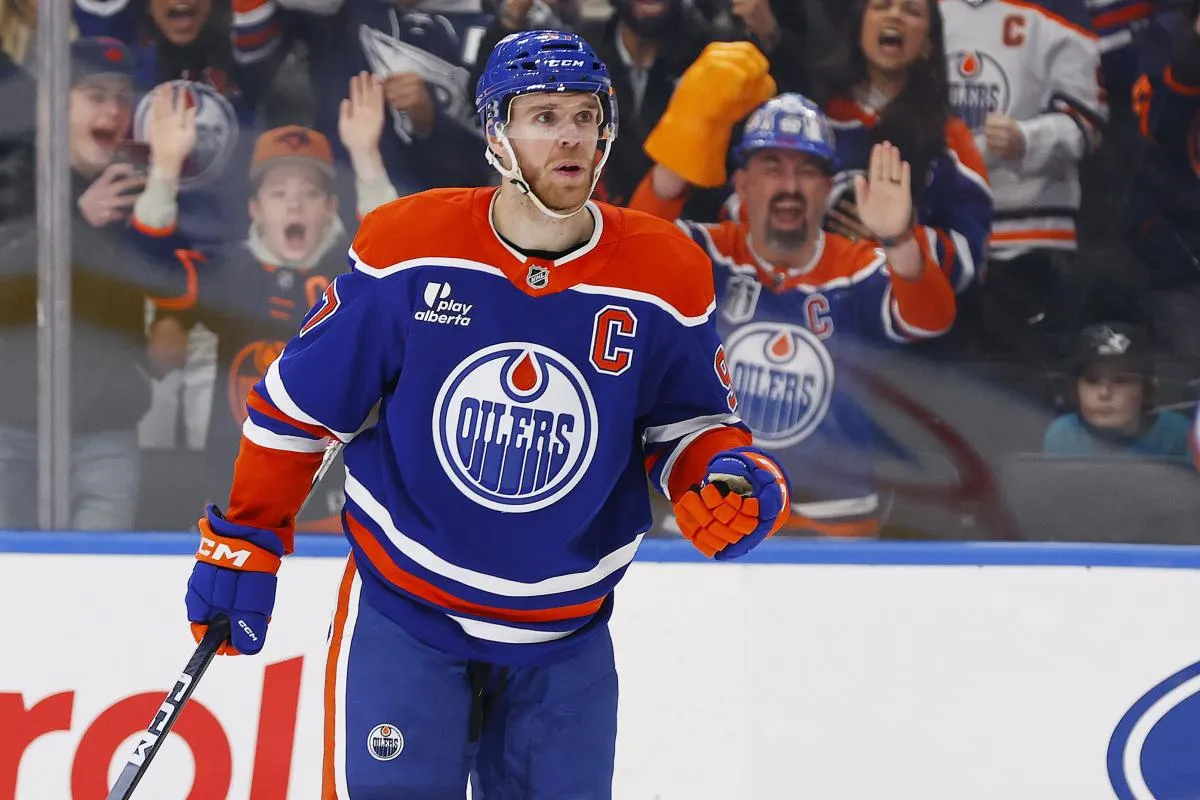 Edmonton Oilers forward Connor McDavid (97) celebrates after scoring a goal against the San Jose Sharks during the third period at Rogers Place.