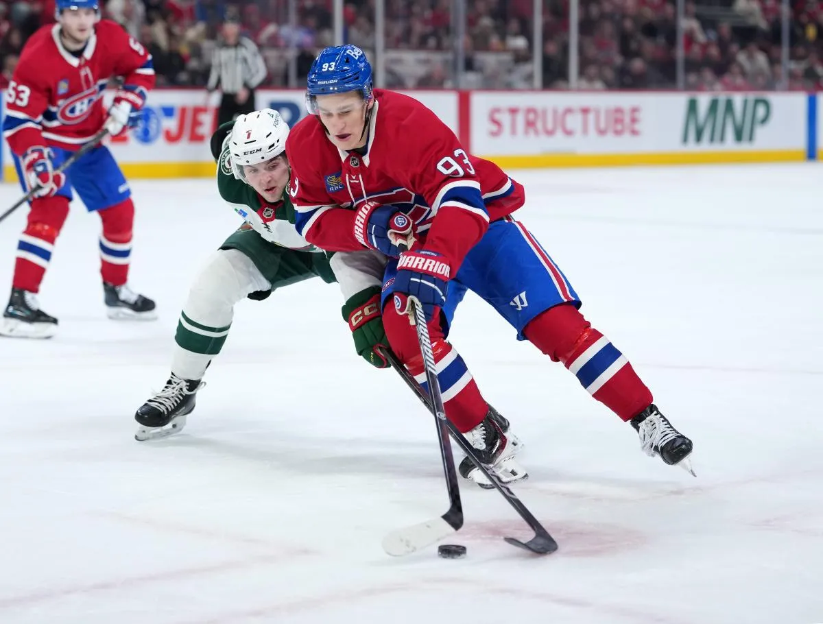 Le 20 janvier 2026, &agrave; Montr&eacute;al, au Qu&eacute;bec, le joueur de hockey Ivan Demidov (93) des Canadiens de Montr&eacute;al joue la rondelle et le d&eacute;fenseur du Wild du Minnesota, Brock Faber (7), le d&eacute;fend lors de la deuxi&egrave;me p&eacute;riode au Centre Bell.