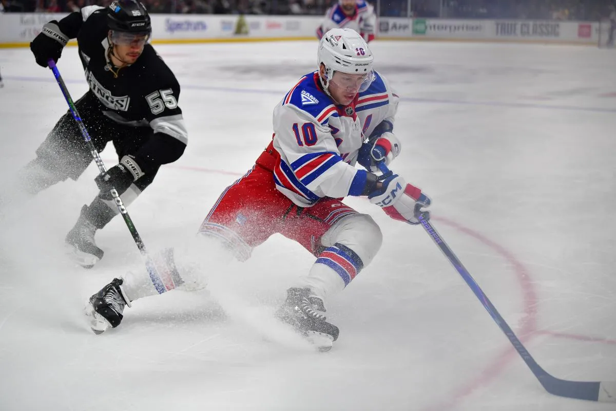 New York Rangers left wing Artemi Panarin (10) moves the puck against Los Angeles Kings right wing Quinton Byfield (55) during the third period at Crypto.com Arena.