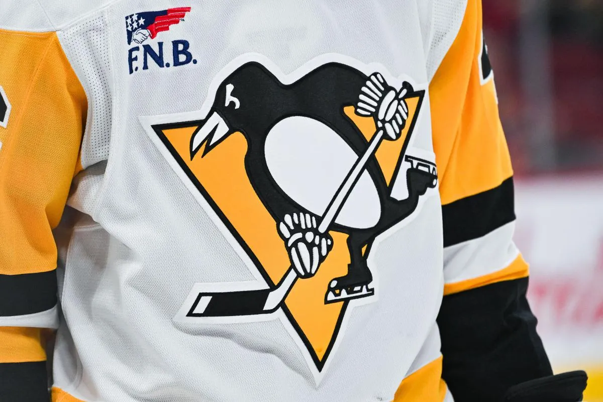 View of a Pittsburgh Penguins logo on a jersey worn by a member of the team during the second period at Bell Centre.