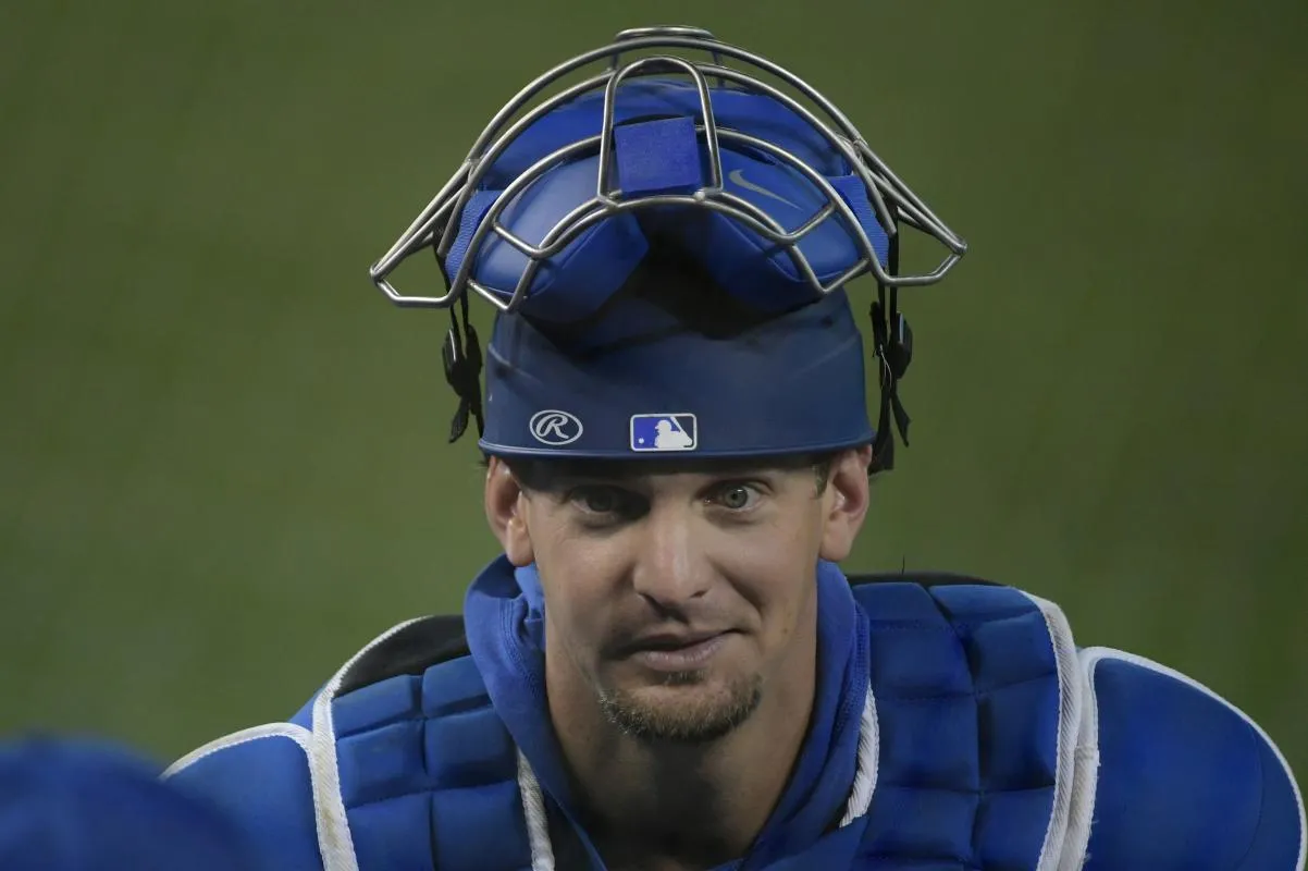 Toronto Blue Jays catcher Caleb Joseph (7) talks to a team mate during summer training camp batting practice at Rogers Centre.