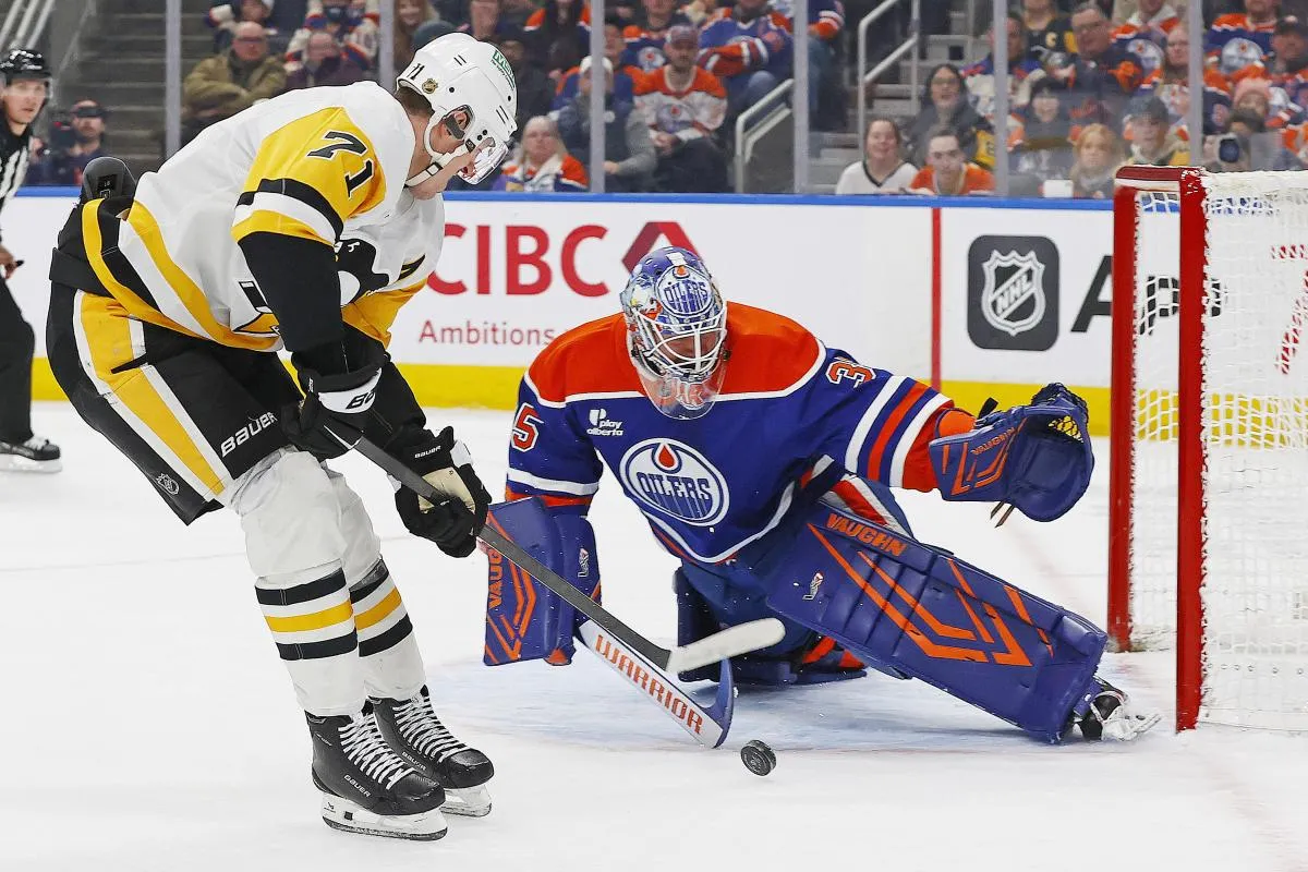 Pittsburgh Penguins forward Evgeni Malkin (71) scores a goal on Edmonton Oilers goaltender Tristan Jarry (35) during the second period at Rogers Place.