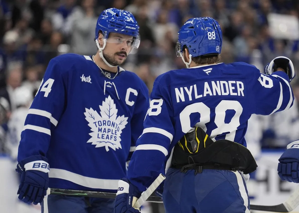 Toronto Maple Leafs forward William Nylander (88) and forward Auston Matthews (34) discuss a play against the Tampa Bay Lightning during the first period at Scotiabank Arena.