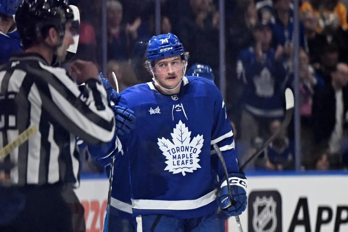 Toronto Maple Leafs forward Bobby McMann (74) celebrates at the bench after scoring a goal against the Nashville Predators in the second period at Scotiabank Arena.