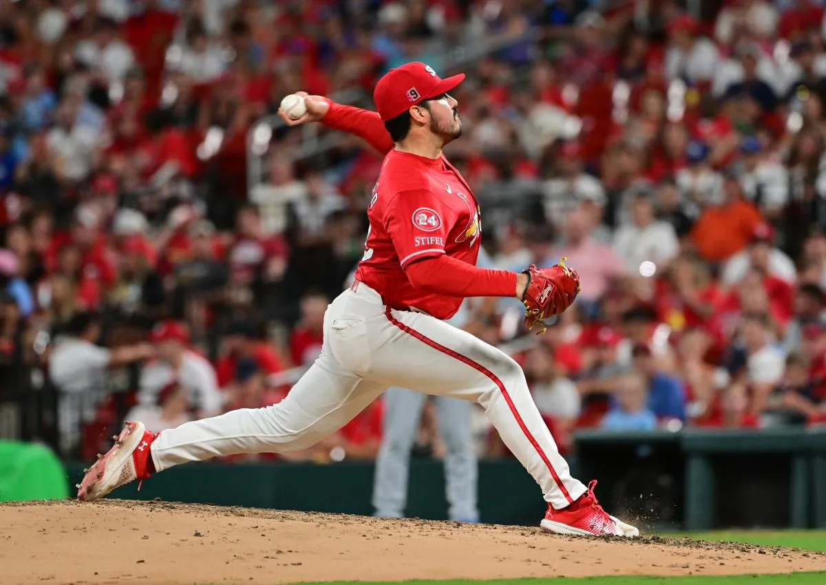St. Louis Cardinals pitcher JoJo Romero (59) pitches against the Los Angeles Dodgers in the eighth inning at Busch Stadium.