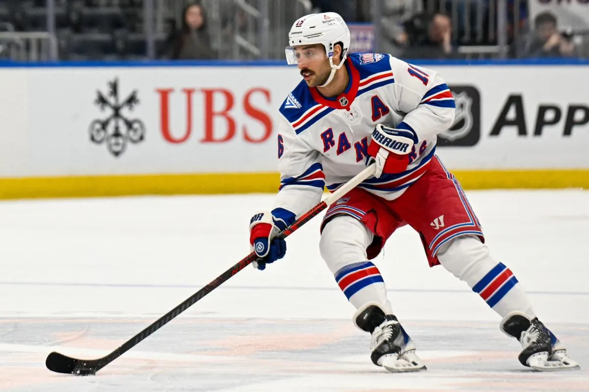 New York Rangers center Vincent Trocheck (16) skates with the puck against the New York Islanders during the third period at UBS Arena.