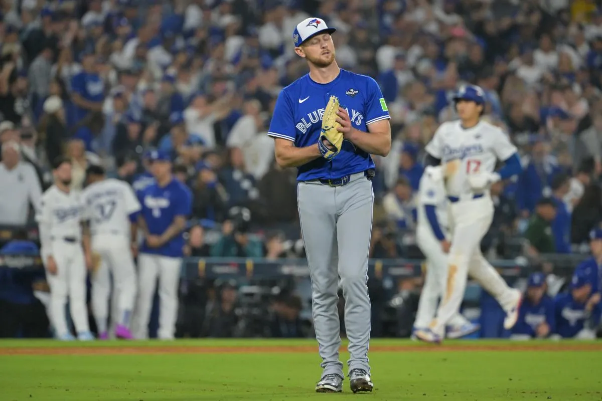 Toronto Blue Jays pitcher Eric Lauer (56) reacts in the thirteenth inning against the Los Angeles Dodgers during game three of the 2025 MLB World Series at Dodger Stadium.