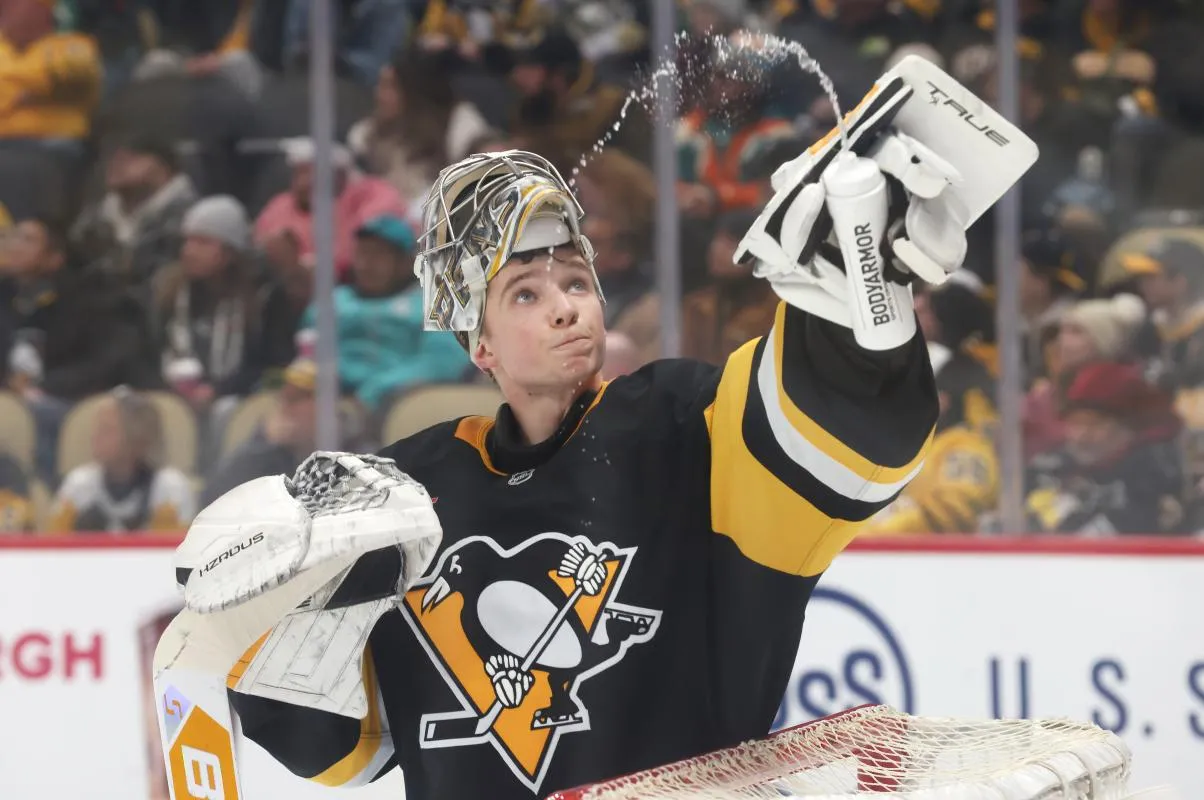 Pittsburgh Penguins goalie Sergei Murashov (1) sprays water in the air against the Utah Mammoth during the second period at PPG Paints Arena.