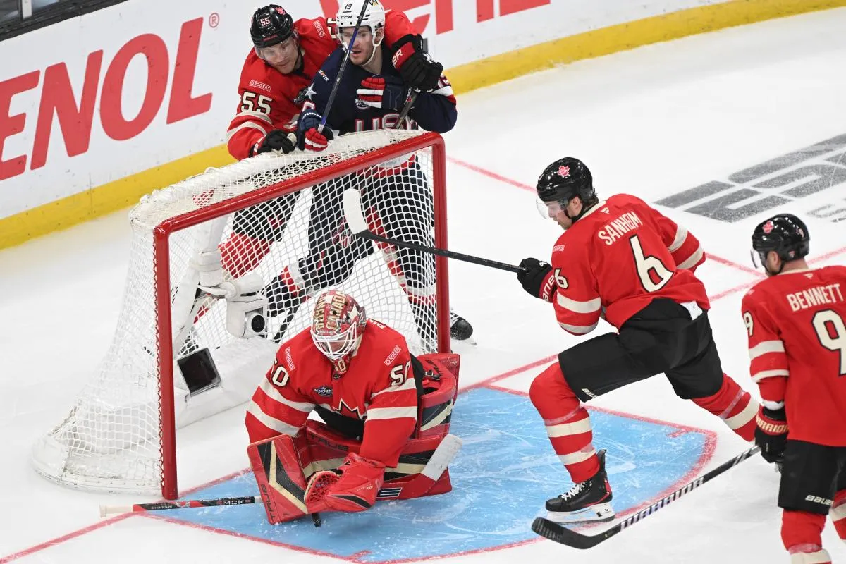 [Imagn Images direct customers only] Team Canada goaltender Jordan Binnington (50) blocks a shot on net by Team USA during the second period during the 4 Nations Face-Off ice hockey championship game at TD Garden.