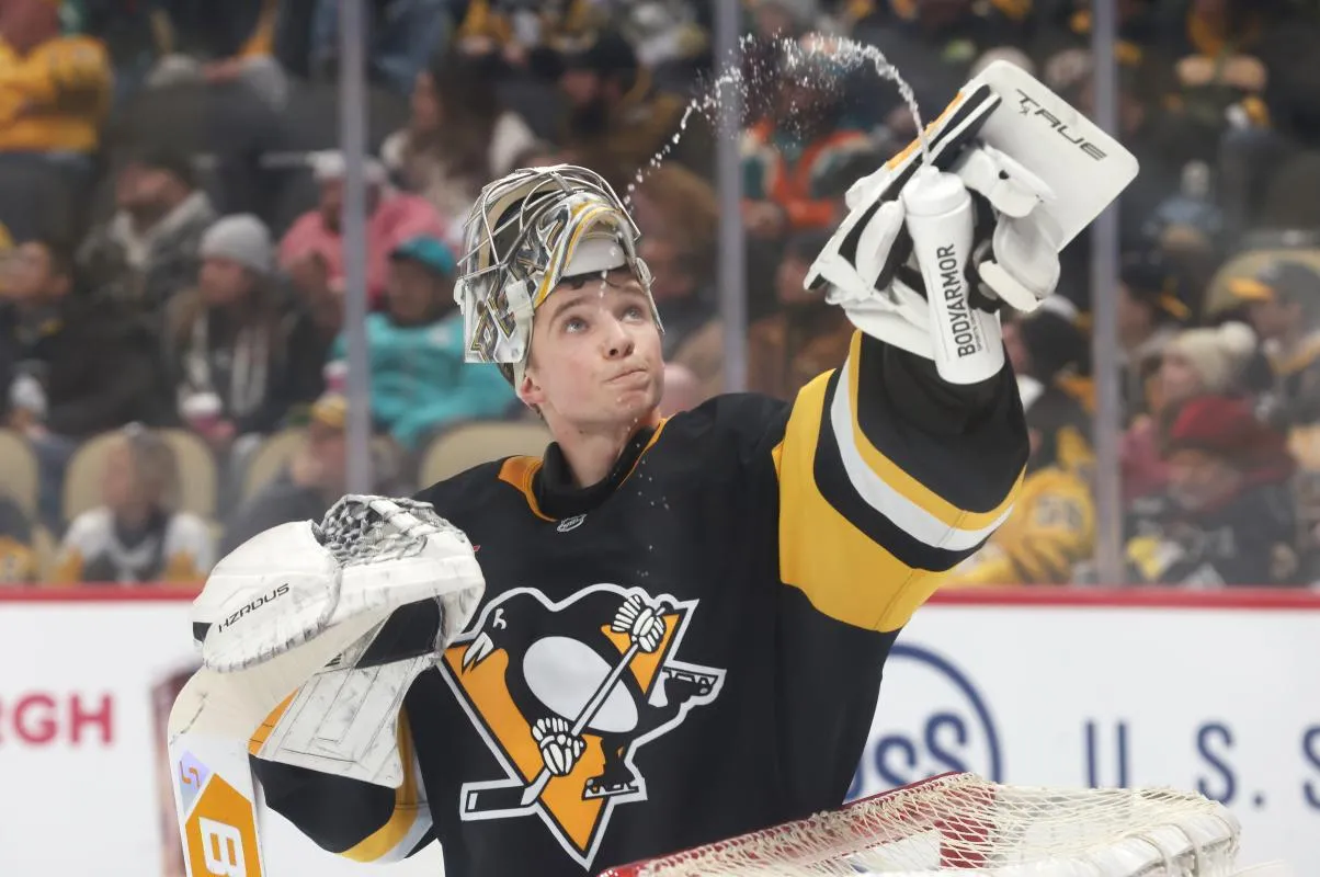 Pittsburgh Penguins goalie Sergei Murashov (1) sprays water in the air against the Utah Mammoth during the second period at PPG Paints Arena.
