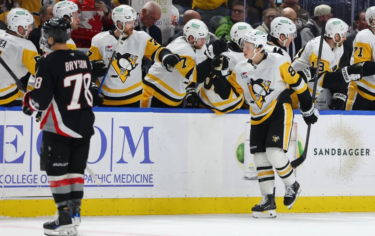 Pittsburgh Penguins center Ben Kindel (81) celebrates his goal with teammates during the second period against the Buffalo Sabres at KeyBank Center.