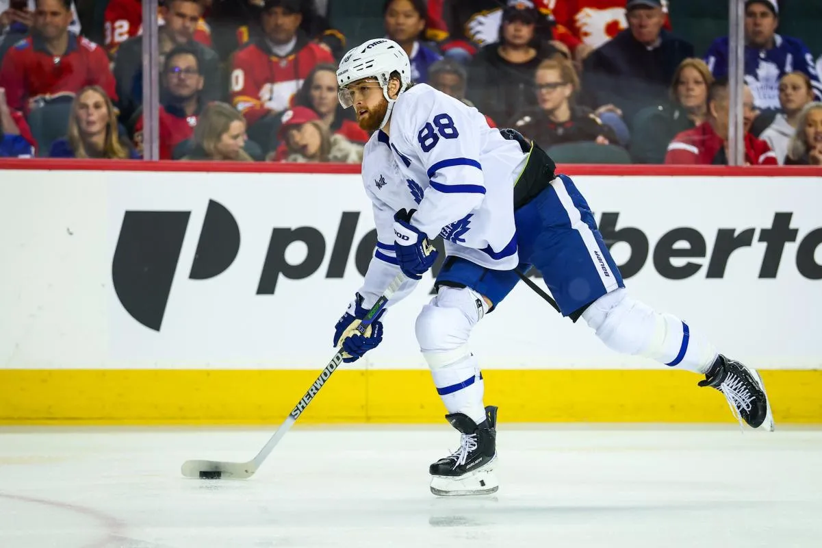 Toronto Maple Leafs right wing William Nylander (88) controls the puck against the Calgary Flames during the third period at Scotiabank Saddledome.