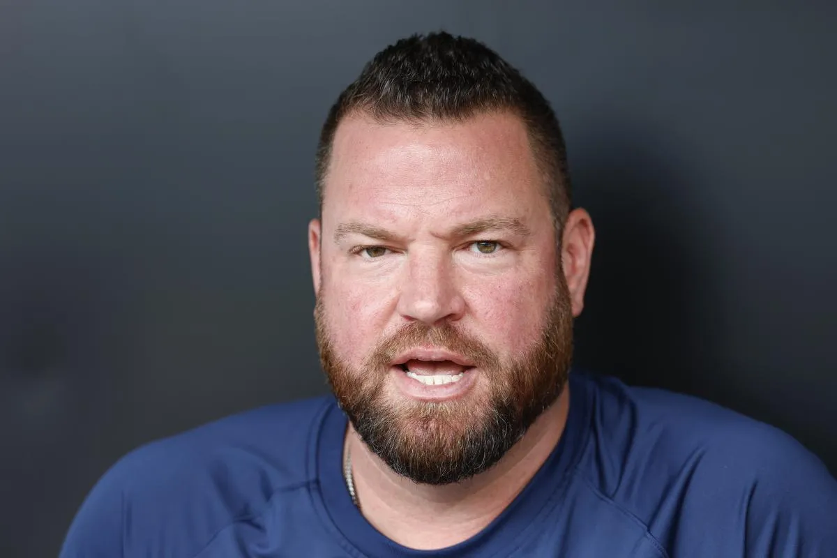Toronto Blue Jays manager John Schneider (14) speaks before a baseball game against the Chicago White Sox at Guaranteed Rate Field.