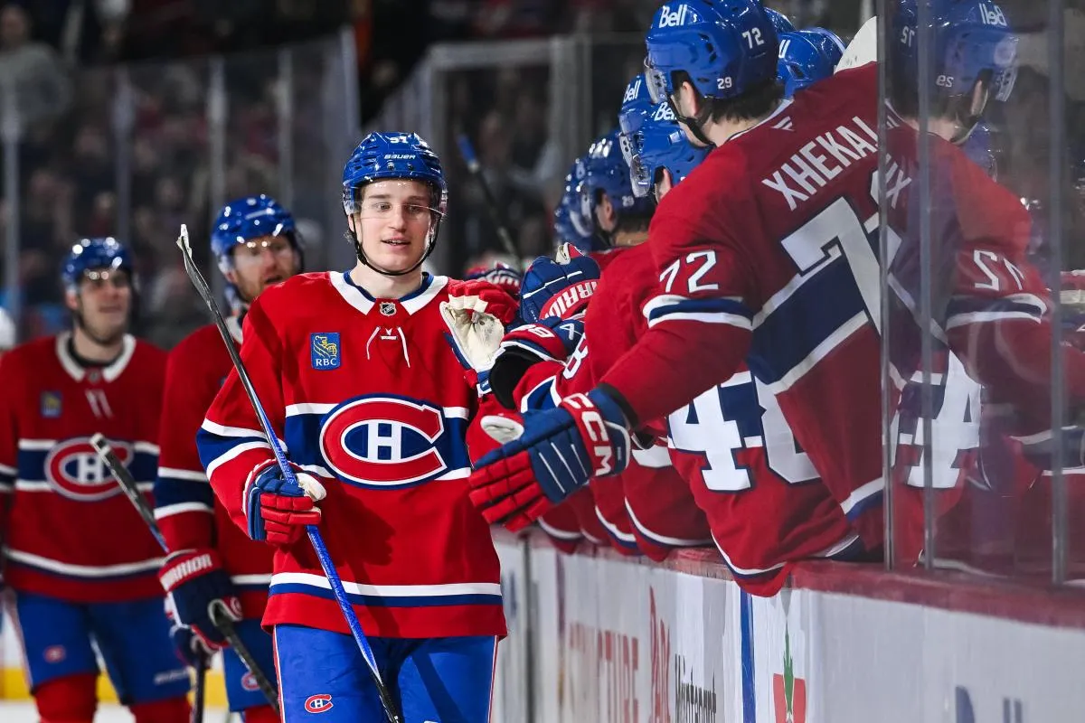 Montreal Canadiens center Oliver Kapanen (91) celebratew with his teammates at the bench his goal against the Vancouver Canucks during the third period at Bell Centre.