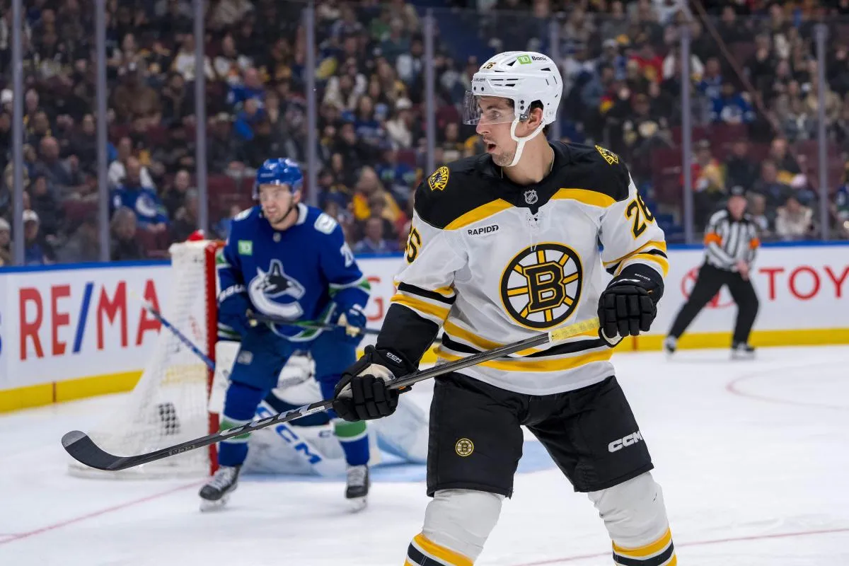 Boston Bruins forward Marc McLaughlin (26) skates against the Vancouver Canucks during the third period at Rogers Arena.