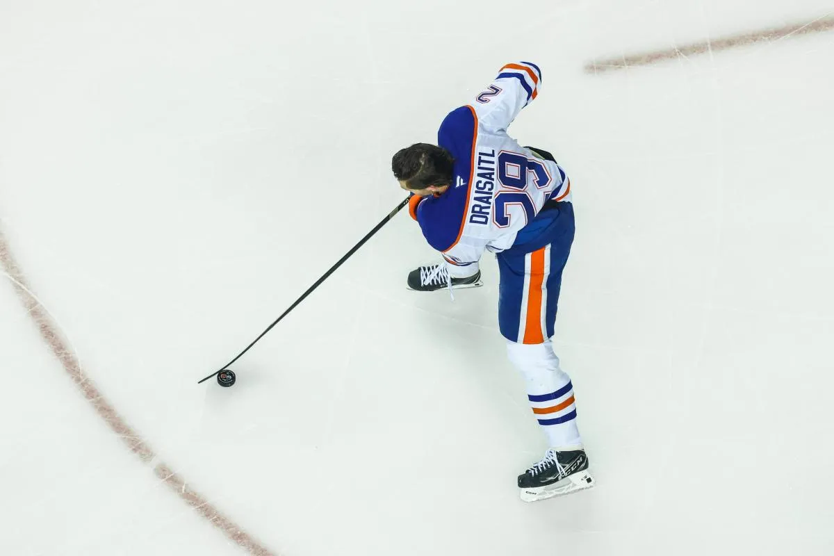 Edmonton Oilers center Leon Draisaitl (29) skates with the puck during the warmup period against the Calgary Flames at Scotiabank Saddledome.