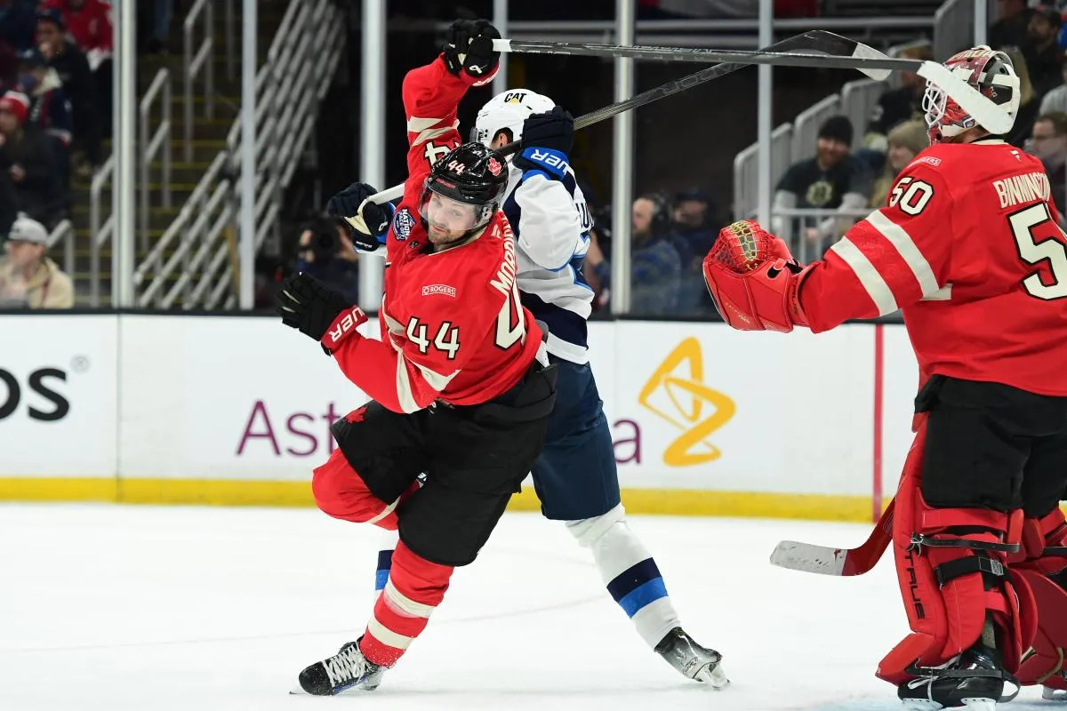 [Imagn Images direct customers only] Team Canada defenseman Josh Morrissey (44) battles with Finland forward Eetu Luostarinen (27) during the second period in a 4 Nations Face-Off ice hockey game at TD Garden.