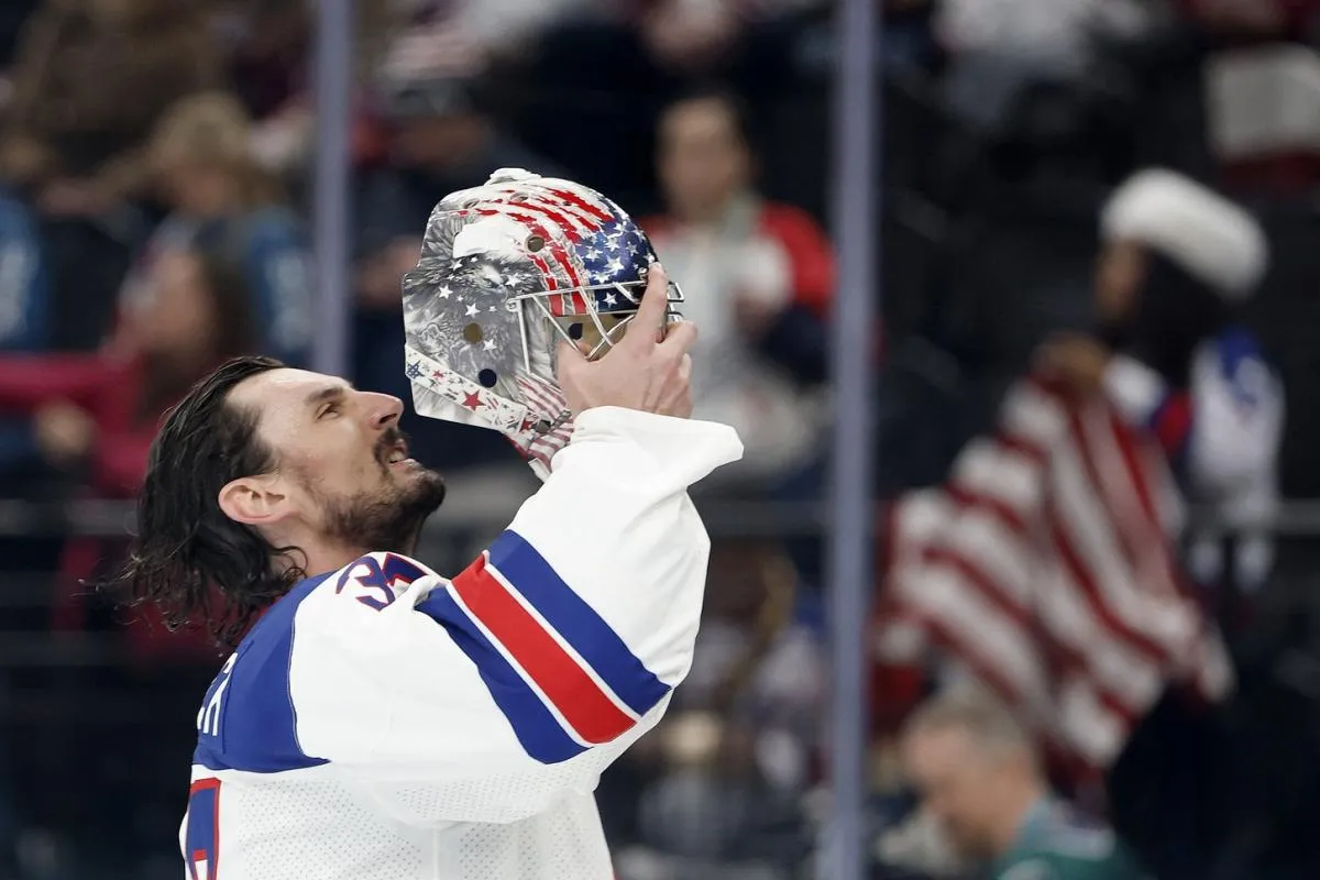Connor Hellebuyck of United States during the warm up before the match against Latvia in men's ice hockey group C play during the Milano Cortina 2026 Olympic Winter Games at Milano Santagiulia Ice Hockey Arena.