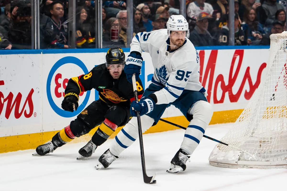 Vancouver Canucks forward Conor Garland (8) pursues Toronto Maple Leafs defenseman Oliver Ekman-Larsson (95) in the second period at Rogers Arena.