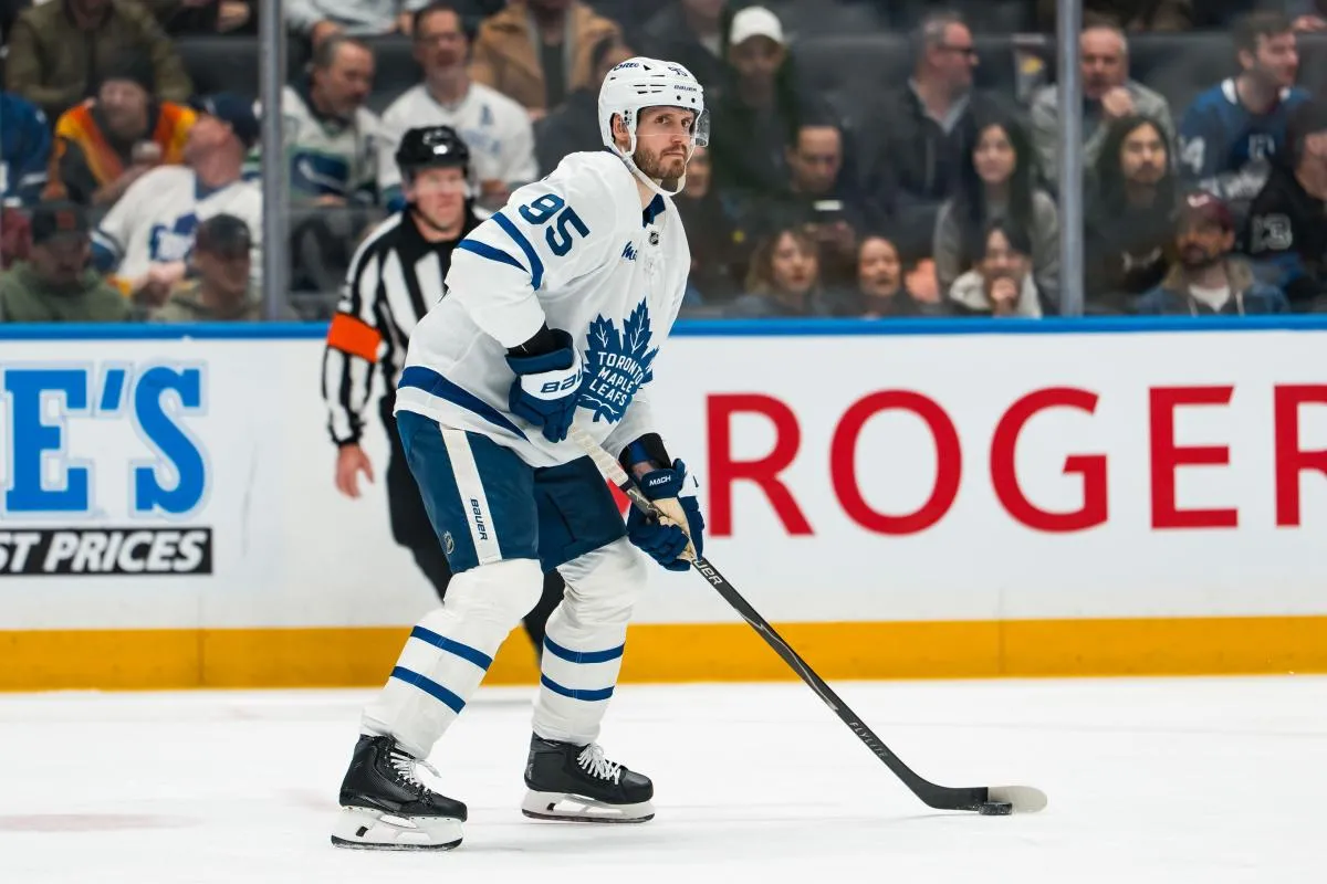 Toronto Maple Leafs defenseman Oliver Ekman-Larsson (95) handles the puck against the Vancouver Canucks in the second period at Rogers Arena.
