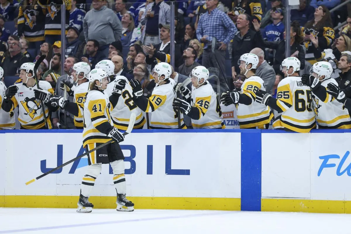 Tampa, Florida, USA;Pittsburgh Penguins right wing Ville Koivunen (41) celebrates after scoring a goal against the Tampa Bay Lightning in the first period at Benchmark International Arena.