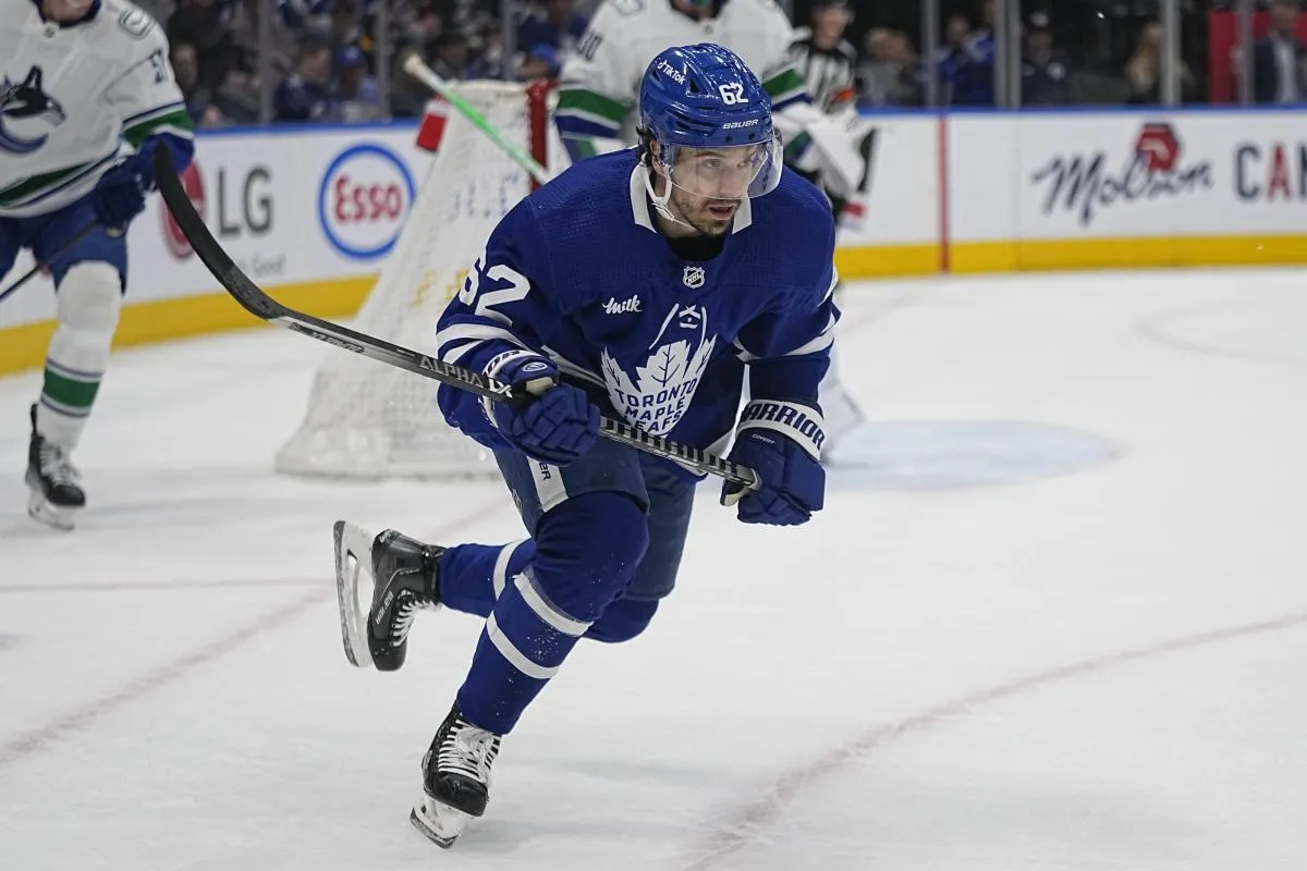Toronto Maple Leafs forward Denis Malgin (62) skates against the Vancouver Canucks during the first period at Scotiabank Arena.